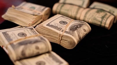 Gambling Money Stacks of Hundreds Rolls of Cash